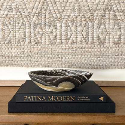 Hand carved small zebra onyx bowl in polished black and white natural stone, luxury decorative accent for elegant interiors