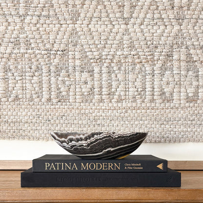 Small hand carved zebra onyx stone bowl with black and white natural striping