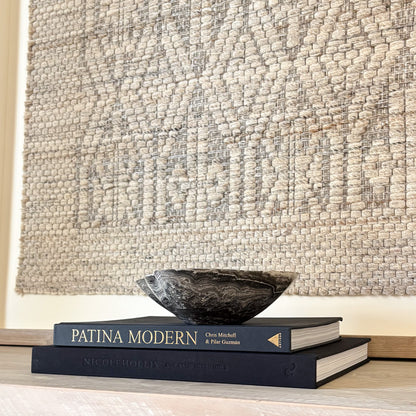 Decorative small zebra onyx bowl hand carved from natural stone with bold striped mineral pattern