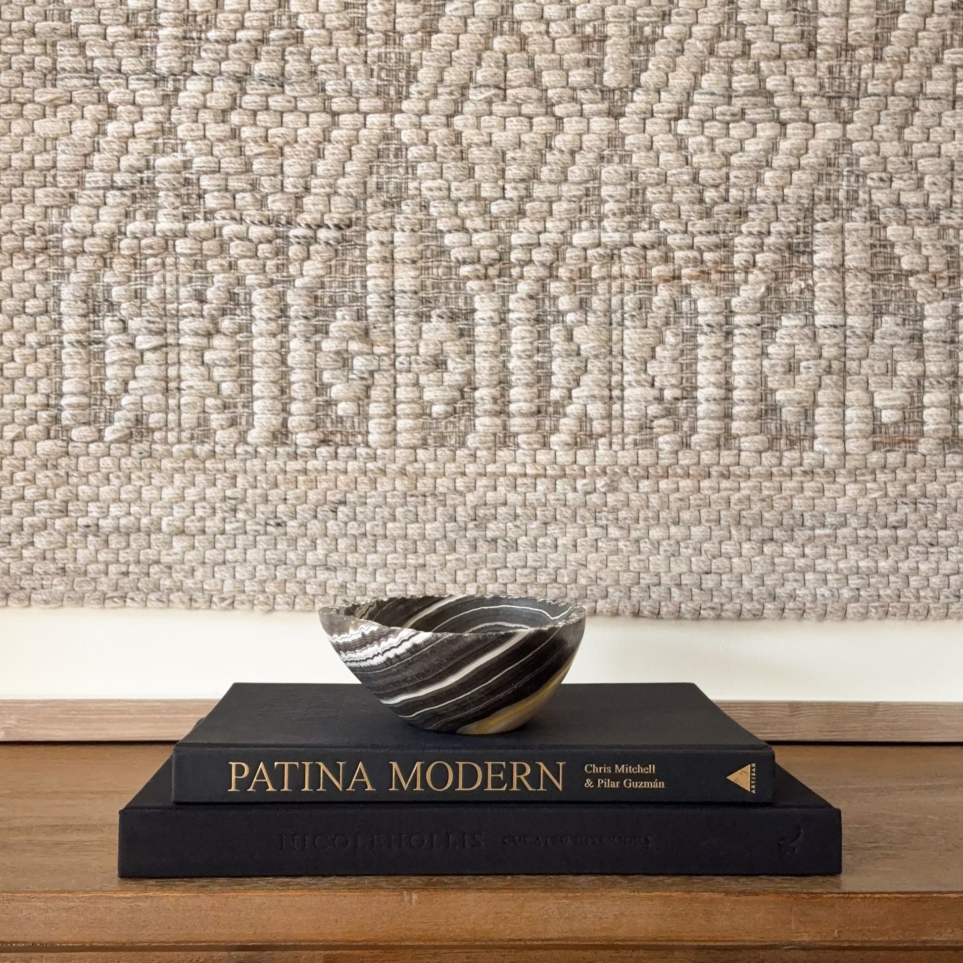 Polished small zebra onyx bowl with unique natural striping detail