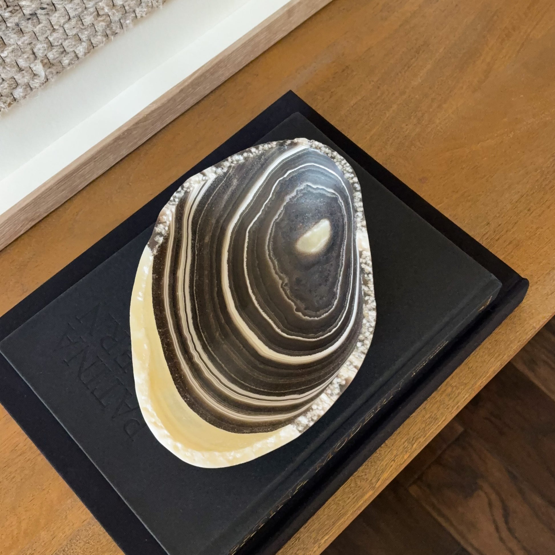 Close up of natural zebra onyx bowl showing layered banding texture