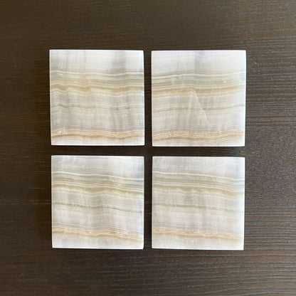 beige and white natural onyx coaster set