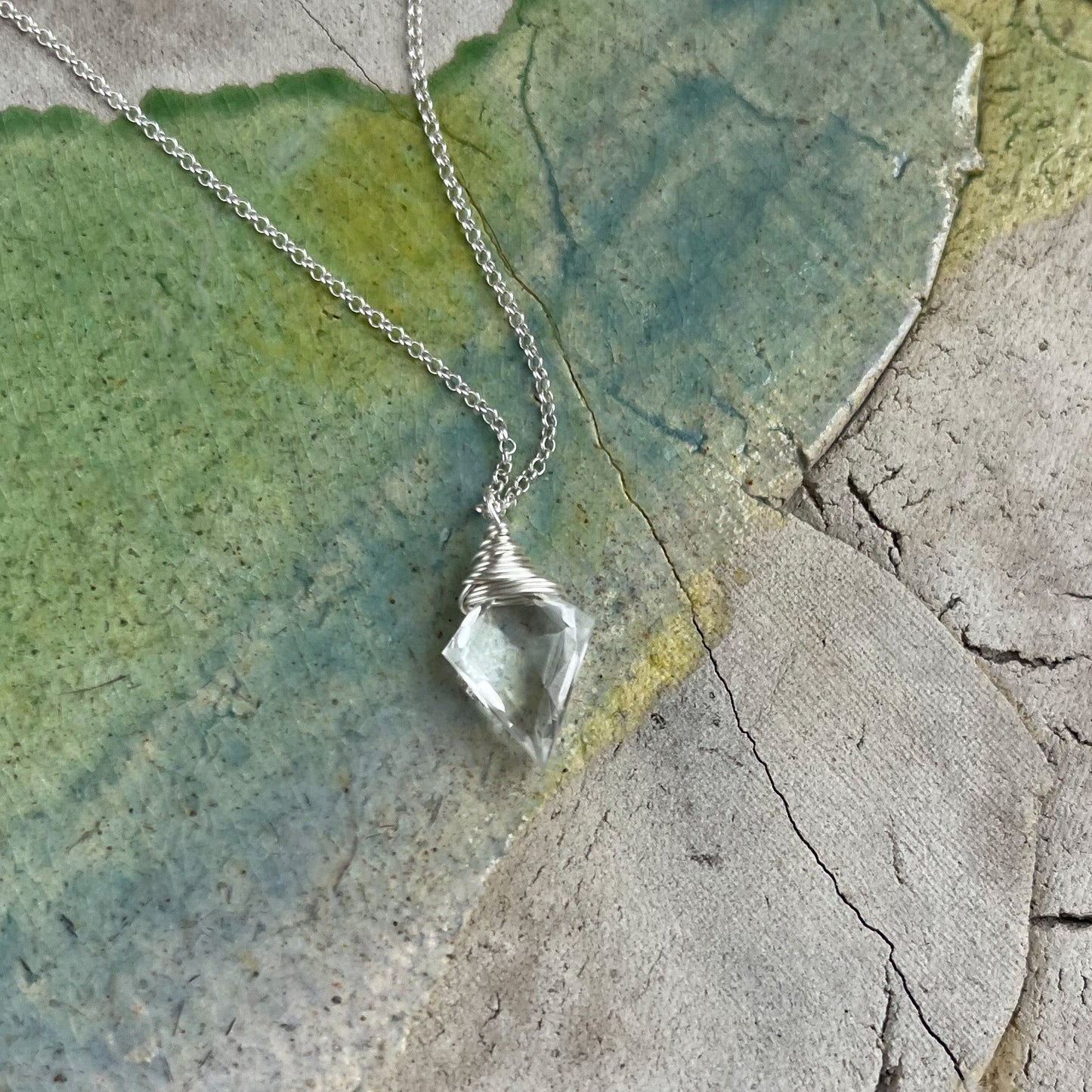 Clear quartz crystal pendant on sterling silver chain