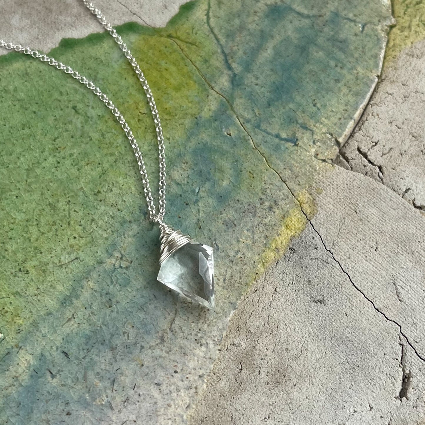 Sterling silver necklace with clear quartz crystal pendant