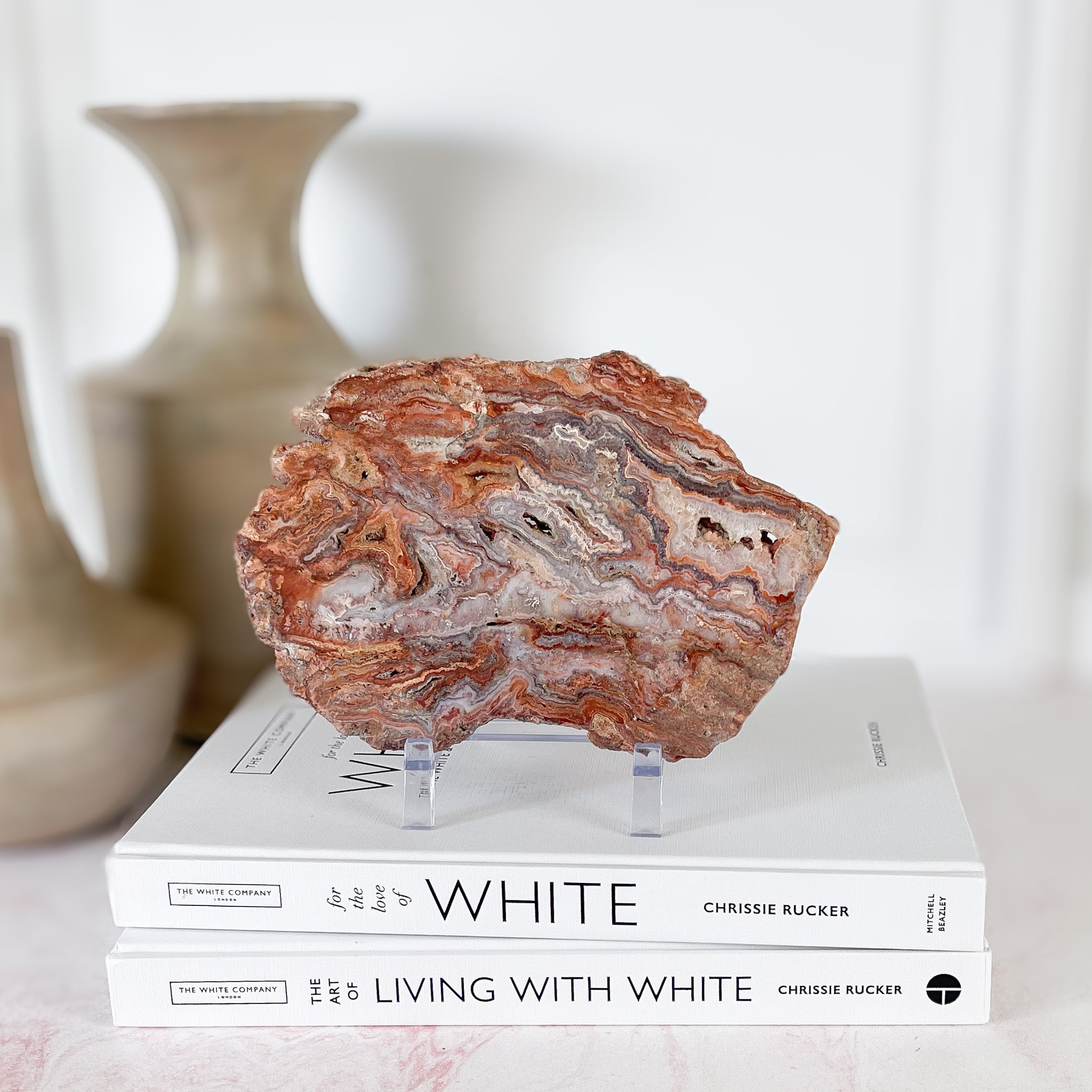 indonesian pink lace agate slice on stand