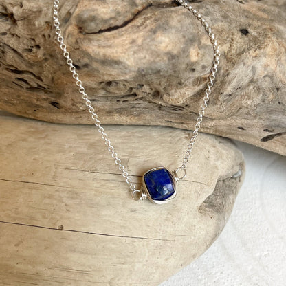 Lapis lazuli bezel wrapped silver necklace