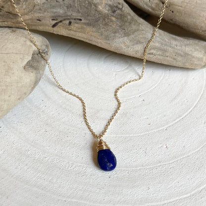 Gold necklace with natural lapis lazuli pendant